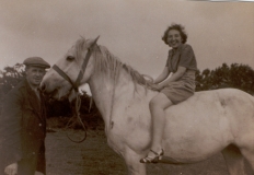 Doris Davis riding a Horse